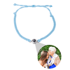 Photo projection friendship band with customised image in blue and silver by TrulyMineCo. Matching couple bracelet