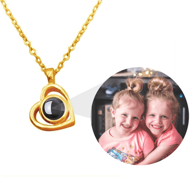Heart projection necklace with customised image in gold by TrulyMineCo. Made of durable stainless steel and plated with 18K gold