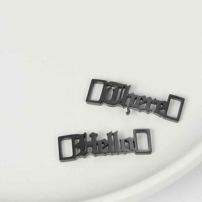 Personalised black shoelace charms with customised font by TrulyMineCo. Made of durable stainless steel